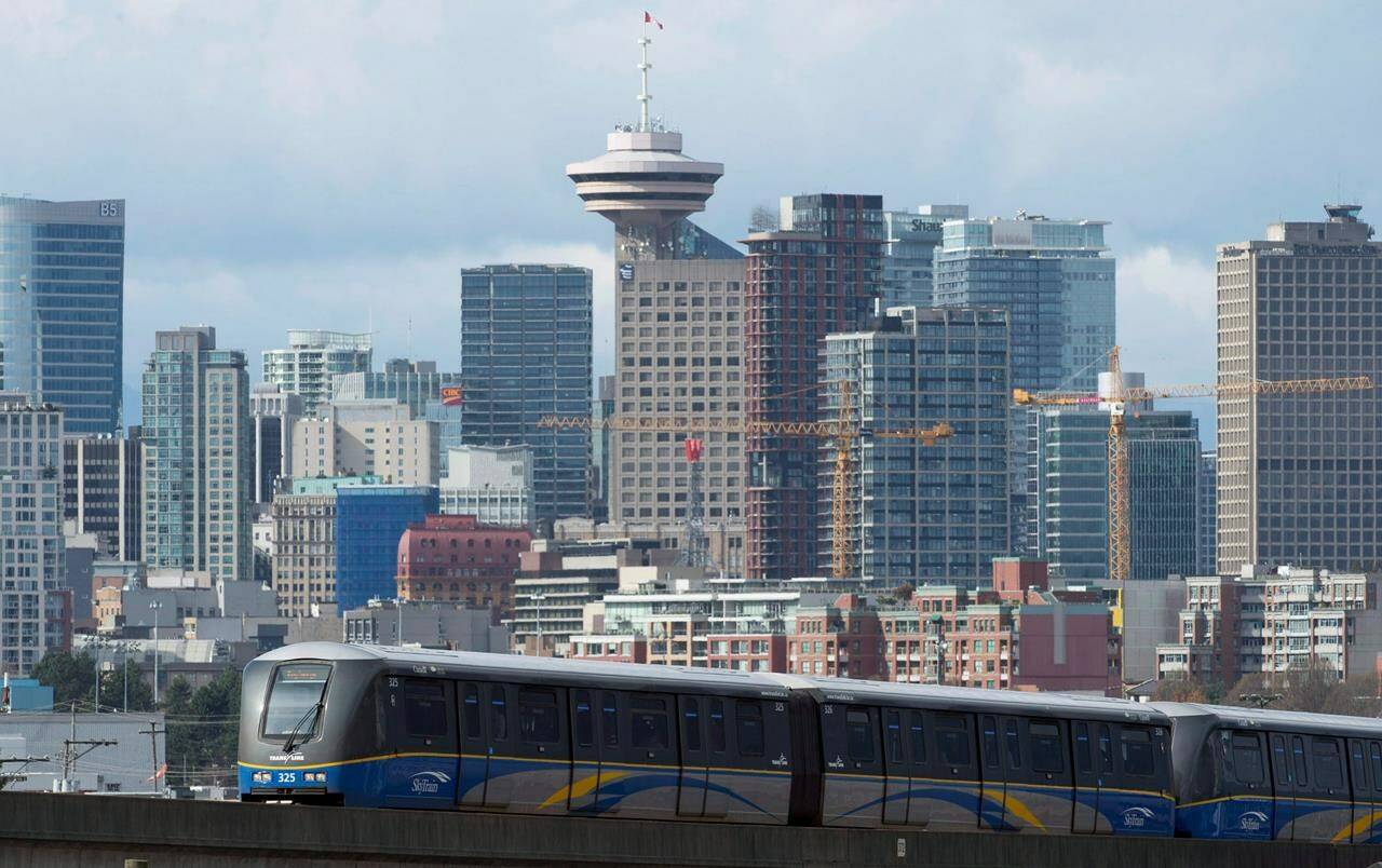 A SkyTrain is pictured in downtown Vancouver, Saturday, March 14, 2015. THE CANADIAN PRESS/Jonathan Hayward