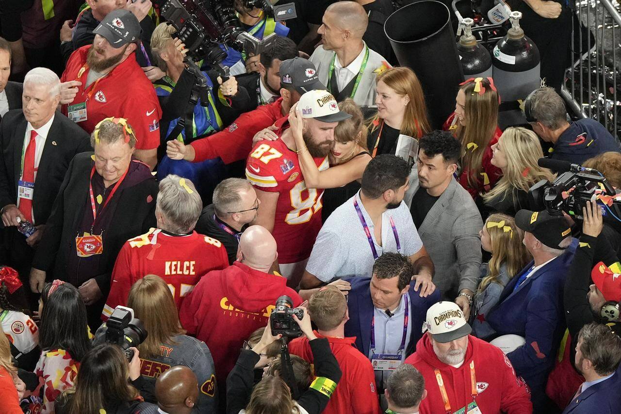 Kansas City Chiefs tight end Travis Kelce (87) hugs his girlfriend Taylor Swift after the team’s victory over the San Francisco 49ers during the NFL Super Bowl 58 football game Sunday, Feb. 11, 2024, in Las Vegas. (AP Photo/David J. Phillip)