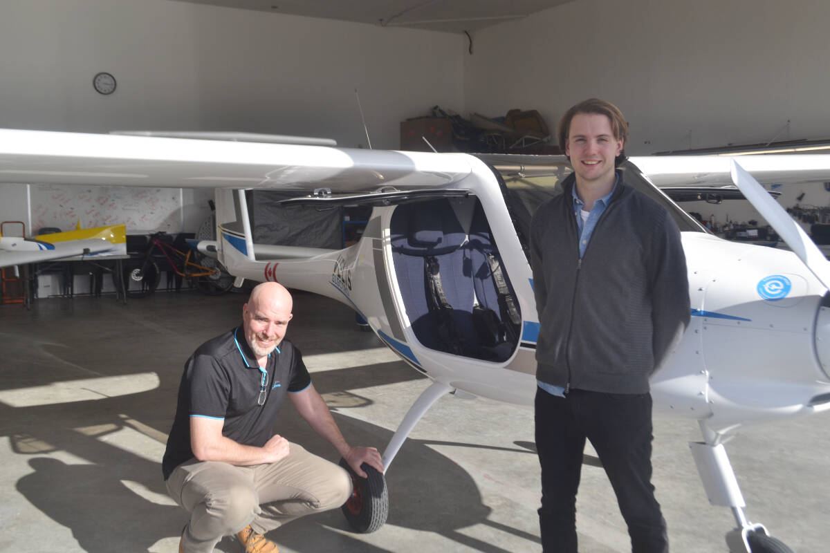 Ian Lamont, chief flight instructor, and Mike Andrews, spokesperson, of Sealand Flight pose with the Velis Electro, the school’s first electric plane. Photo by Brendan Kyle Jure/Campbell River Mirror.