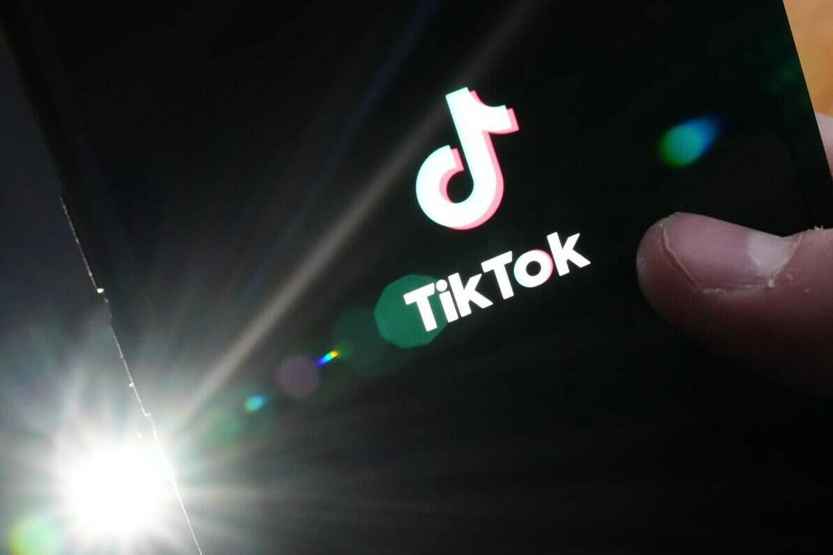 The Liberal government ordered a national security review of popular video app TikTok in September 2023 but did not disclose it publicly. The TikTok startup page is displayed on a cellphone in Ottawa on Monday, Feb. 27, 2023. THE CANADIAN PRESS/Sean Kilpatrick