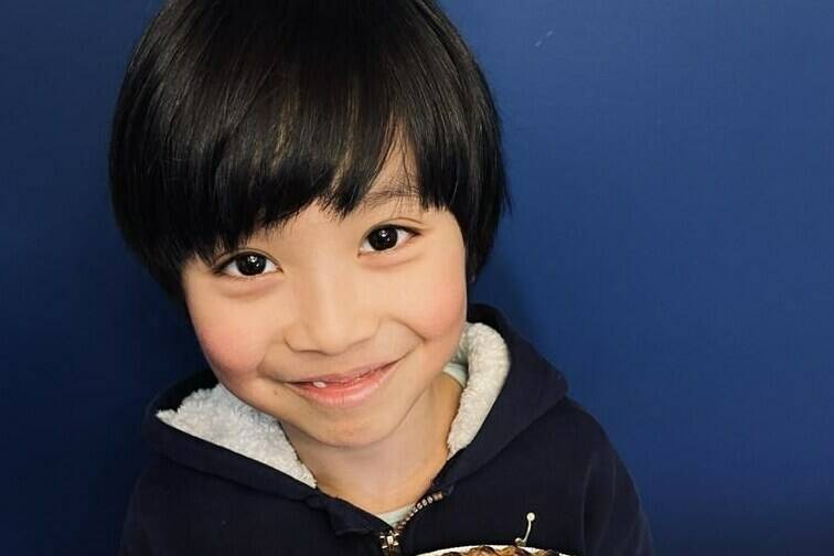 Lucas Mason Yao from Pitt Meadows, B.C., holds a pie with a Pi sign on it in a 2023 handout photo. Yao has memorized the ratio between a circle’s circumference and its diameter to 2,030 digits, far beyond the three-point-one-four that’s close enough for most people. THE CANADIAN PRESS/HO-Cindy Liu