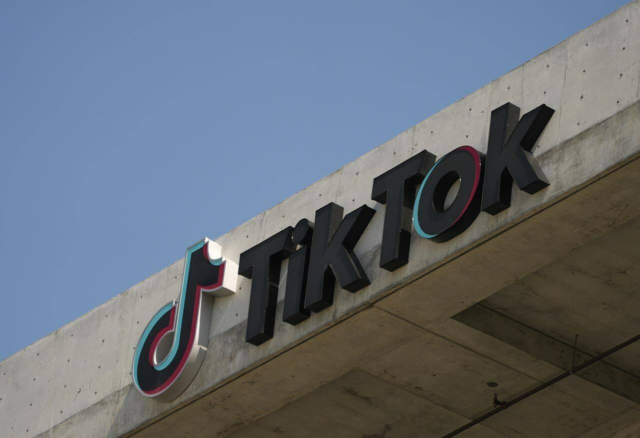The TikTok Inc. logo is seen on their building in Culver City, Calif., Monday, March 11, 2024. Prime Minister Justin Trudeau says he’s not going to comment on the future of TikTok in the United States, but says his own government will continue to look out for the security of Canadians. THE CANADIAN PRESS/AP-Damian Dovarganes